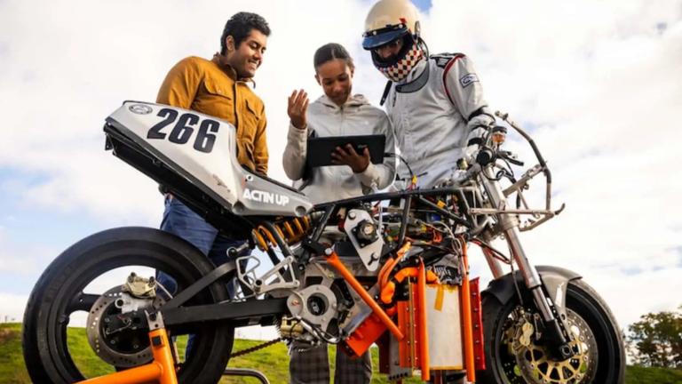 Electric Vehicle Team members (from left to right) Anand John, Rachel Mohammed, and Aditya Mehrotra '22, SM '24 monitor their bike’s performance, battery levels, and hydrogen tank levels to estimate the vehicle’s range.